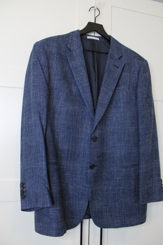 Blue suit jacket on a white background