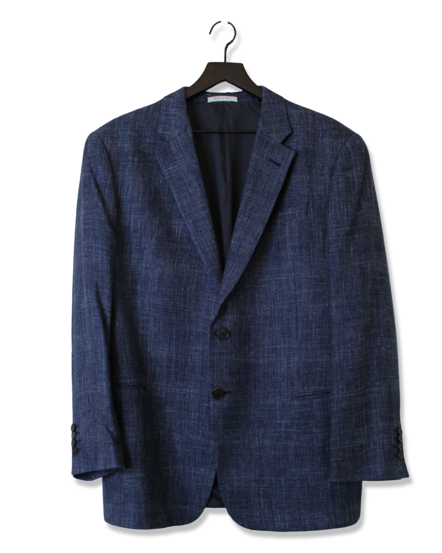 Blue suit jacket on a hanger against a white background